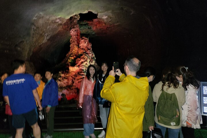 Discover the unique beauty of Jeju's volcanic caves where natural formations and historical tales come together inviting travelers to explore and connect with the island's rich geological heritage.
